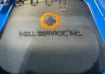 Custom logo being embroidered.